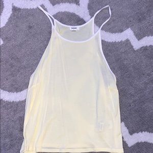 Light yellow garage tank.